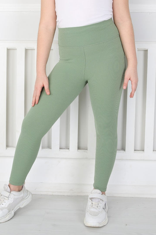 Yeşil renkli, yüksek belli ve fitilli kumaştan üretilmiş kız çocuk günlük tayt.