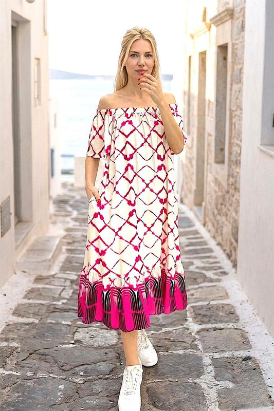 Fuşya desenli, madonna yakalı, cepli ve fırfırlı etekli uzun viskon elbise.