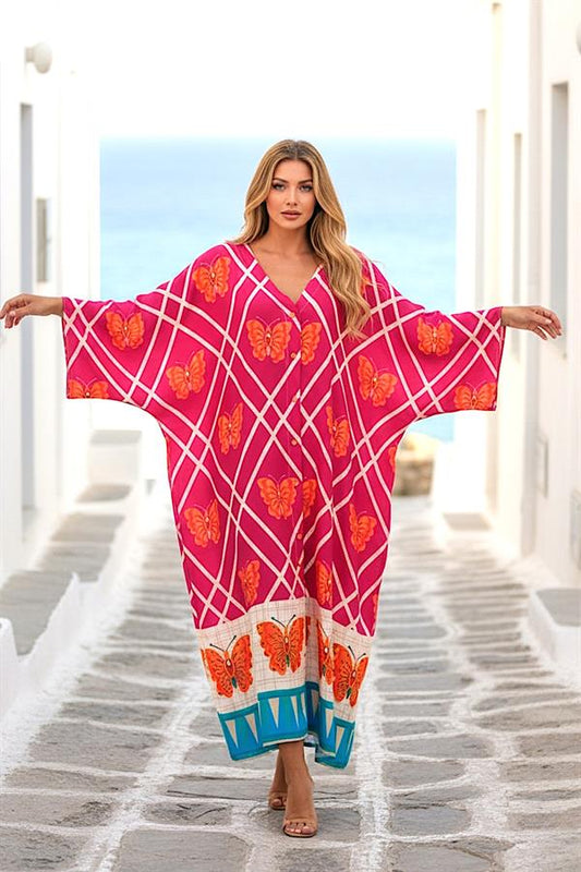 Fuşya renkli, kelebek desenli, V yaka, yarasa kollu ve düğmeli uzun viskon elbise.