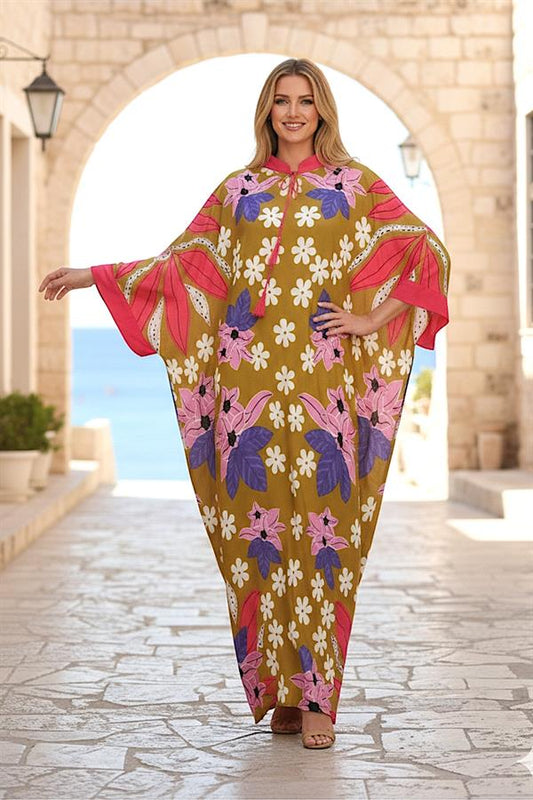 Hardal rengi, çiçek desenli, sıfır yaka, yarasa kollu ve oversize uzun viskon elbise.