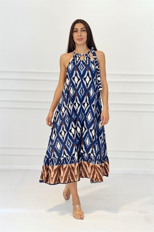 Lacivert renkli, etnik desenli, boyundan bağlamalı ve uzun viskon elbise.