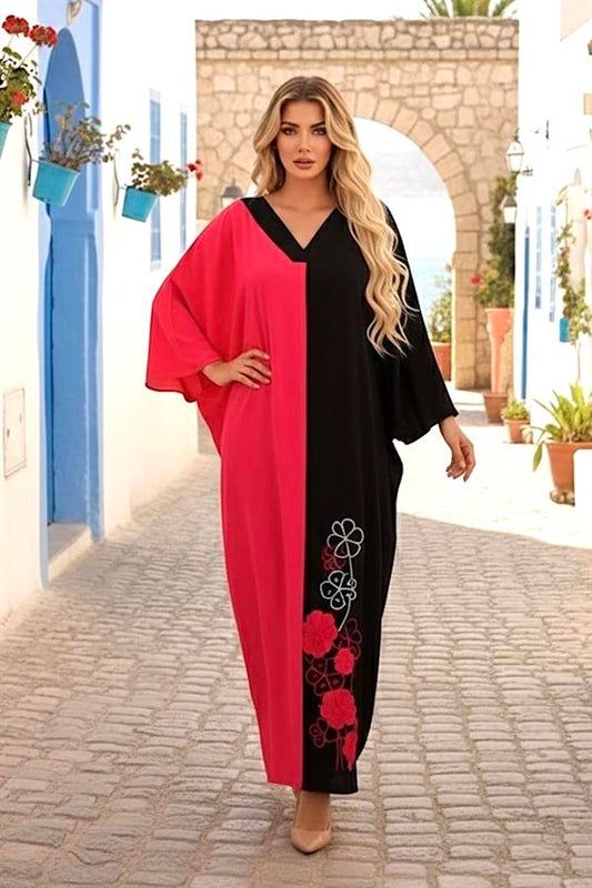 Pembe ve siyah renkli, V yakalı, etek ucu nakışlı, oversize uzun viskon elbise.