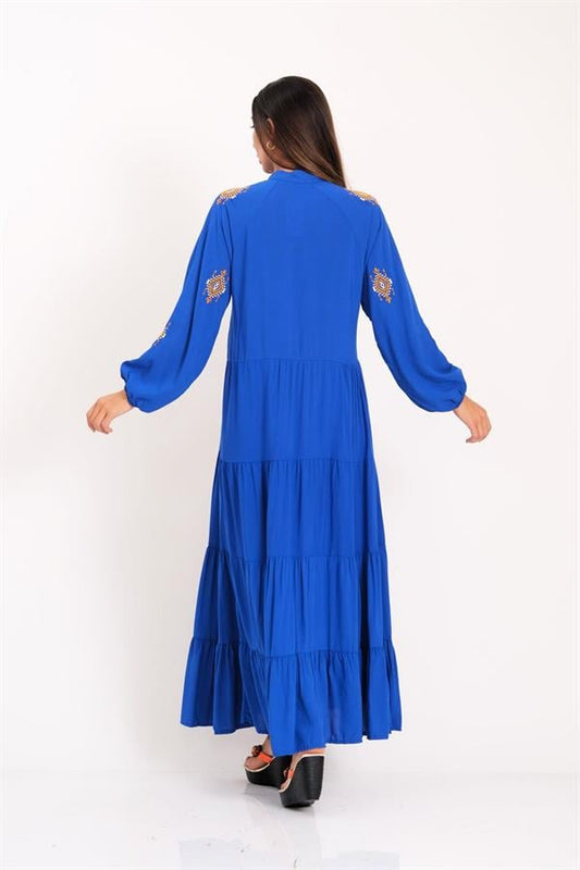 Saks mavisi, kolları ve omuzları otantik nakışlı, kat kat etekli uzun viskon elbise.