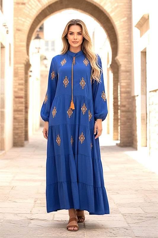 Saks mavisi, önü ve kolları otantik nakışlı, püskül bağcıklı ve kat kat uzun elbise.