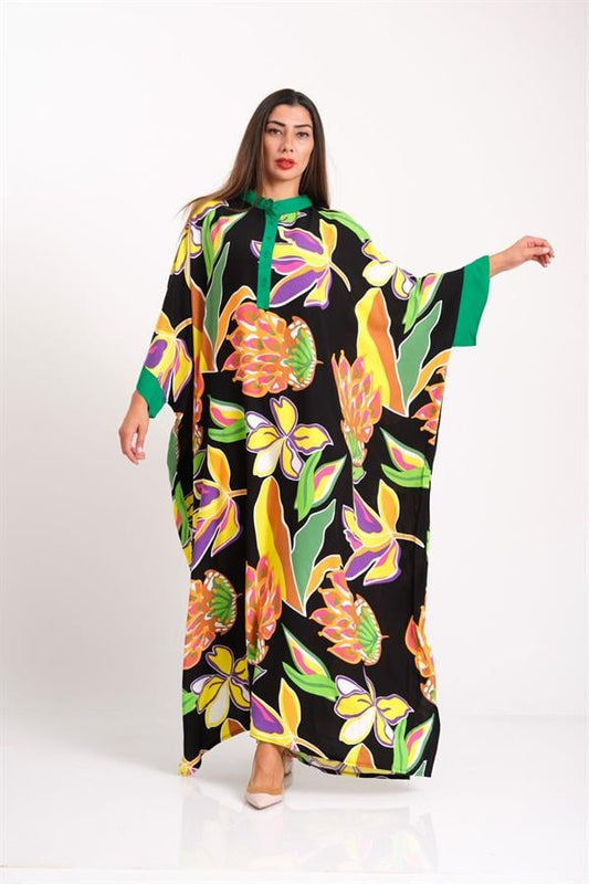 Siyah zemin üzerine renkli çiçek desenli, yarasa kollu ve önü düğmeli uzun viskon elbise.