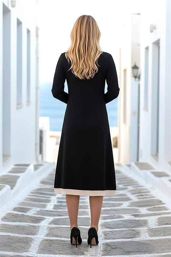 Siyah renkli, uzun kollu ve etek ucu bej detaylı modal elbise.