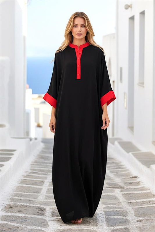 Kırmızı detaylı, düğmeli, yarasa kollu, siyah uzun oversize elbise.