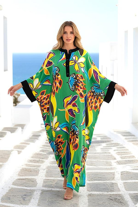 Yeşil renkli, çiçek desenli, yarasa kollu ve önü düğmeli uzun viskon elbise.
