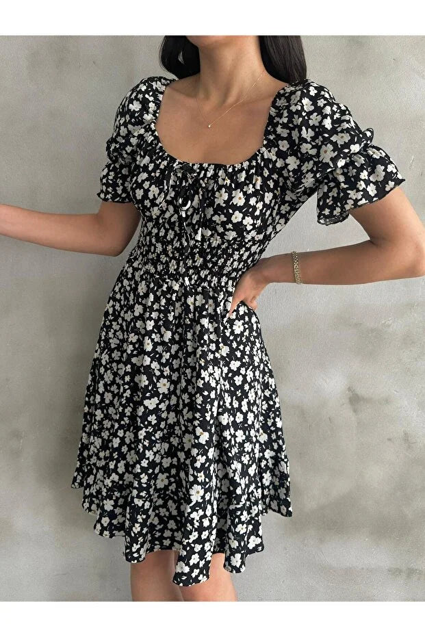 Kayık Yaka Gipeli Bürümcük Mini Elbise – Siyah