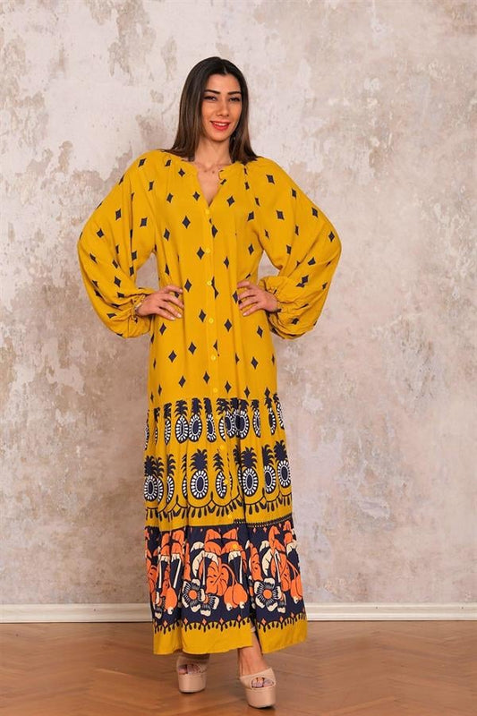 Hardal rengi, V yaka, balon kollu, önden düğmeli ve etek ucu desenli uzun viskon elbise.