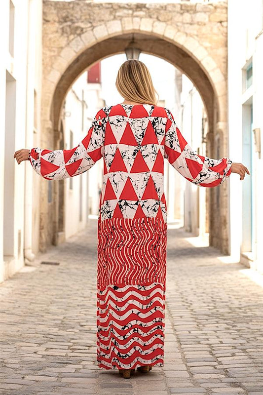 Kiremit rengi desenli, kayık yaka ve balon kollu uzun viskon elbise.