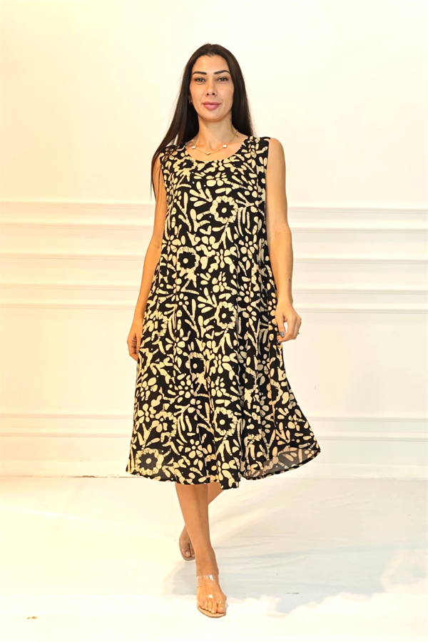 Siyah ve bej renkli, desenli, U yaka, askılı midi boy viskon elbise.