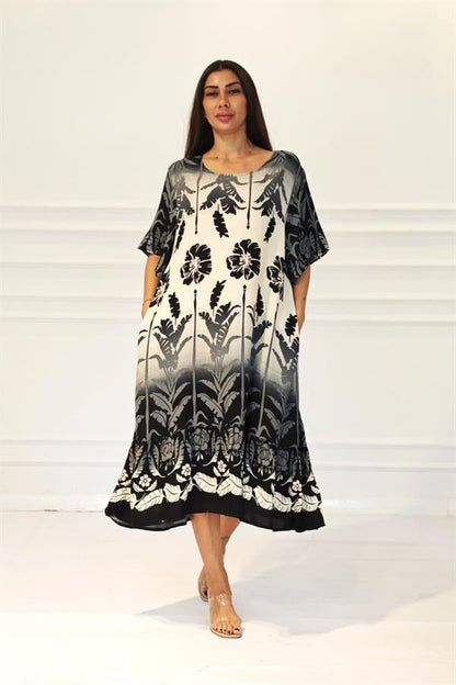 Siyah Çiçekli Kayık Yaka Cepli Etekleri Fırıfırlı Midi Elbise